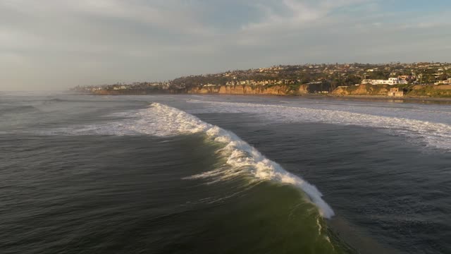 A perfect Sunset over the Pacific Beach coastline and Tourmaline in San Diego | Drone Video