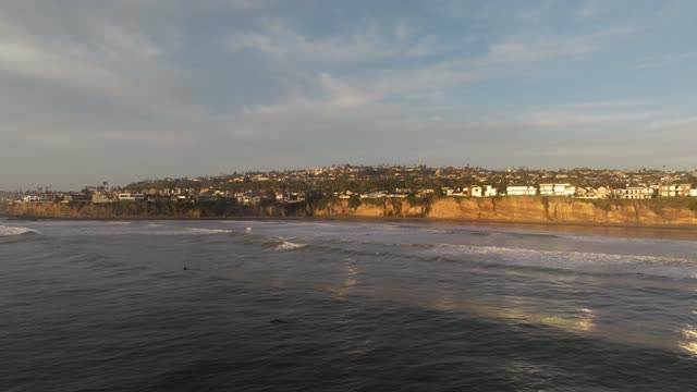 A perfect Sunset over the Pacific Beach coastline and Tourmaline in San Diego | Drone Video – 2
