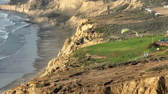 Paragliders at Torrey Pines Gliderport ready to fly over Black’s Beach San Diego | Drone Video