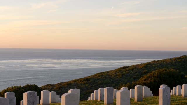 The view of the ocean and headstones at Fort Rosecrans National Cemetery in Point Loma | Video – 12