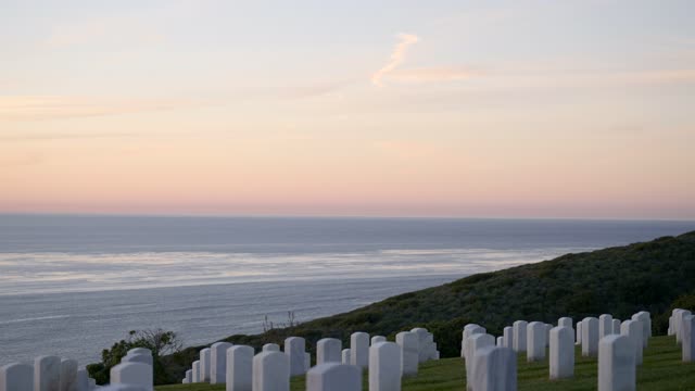 The view of the ocean and headstones at Fort Rosecrans National Cemetery in Point Loma | Video – 9
