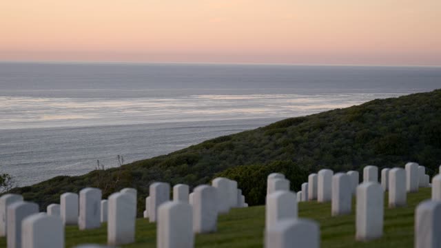 The view of the ocean and headstones at Fort Rosecrans National Cemetery in Point Loma | Video – 10