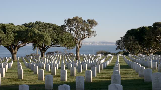 The view of the ocean and headstones at Fort Rosecrans National Cemetery in Point Loma | Video – 8