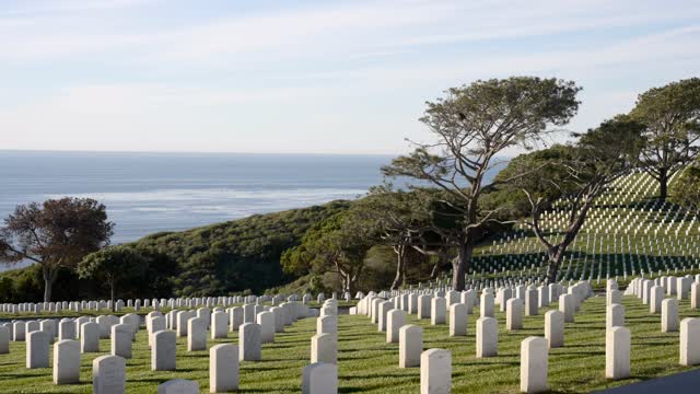 The view of the ocean and headstones at Fort Rosecrans National Cemetery in Point Loma | Video – 1