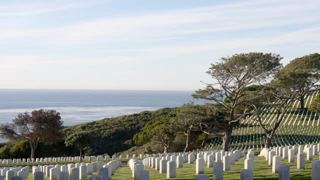 The view of the ocean and headstones at Fort Rosecrans National Cemetery in Point Loma | Video – 6