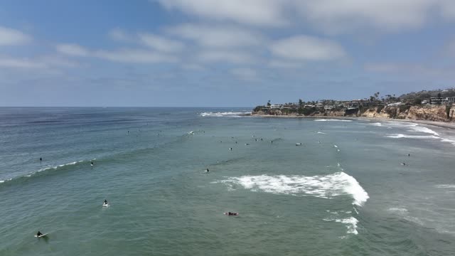 Surfers out at Tourmaline by Law Street Beach in Pacific Beach | Drone Video – 1