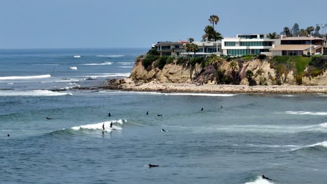 Surfers out at Tourmaline by Law Street Beach in Pacific Beach | Drone Video – 3