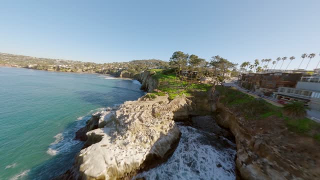 Footage of the Cliffs below Coast Walk Trail at La Jolla Cove | FPV Drone Video – 3