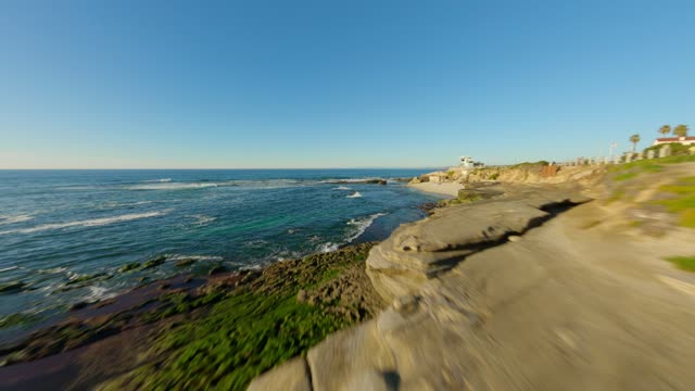 Footage of Children’s Pool Wipeout Beach and Boomer Beach in La Jolla during Sunset | FPV Drone Video – 1