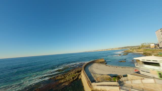 Footage of Children’s Pool Wipeout Beach and Boomer Beach in La Jolla during Sunset | FPV Drone Video – 4