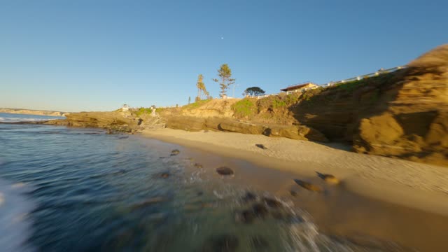 Footage of Children’s Pool Wipeout Beach and Boomer Beach in La Jolla during Sunset | FPV Drone Video – 8