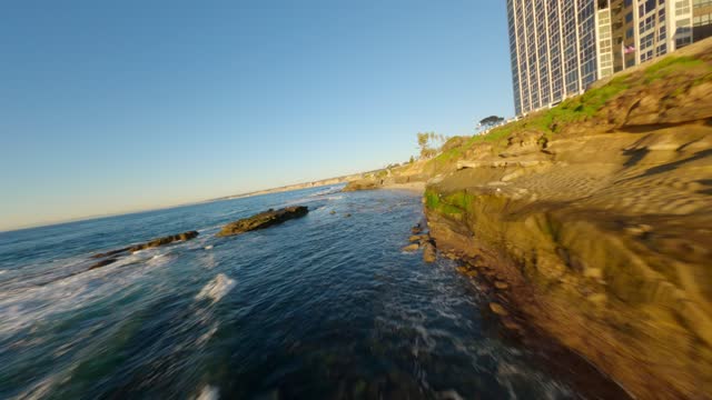 Footage of Children’s Pool Wipeout Beach and Boomer Beach in La Jolla during Sunset | FPV Drone Video – 10