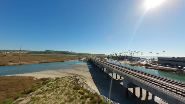 Flying over Cardiff State Beach the waves and San Elijo Lagoon | FPV Drone Video