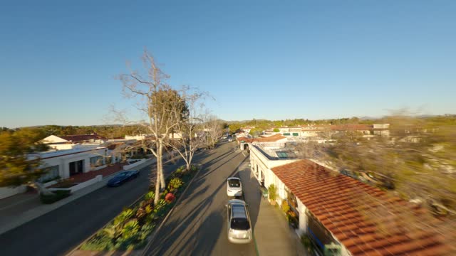 Flying over Paseo Delicias the shops restaurants and the Inn at Rancho Santa Fe in the Covenant | FPV Drone Video – 15