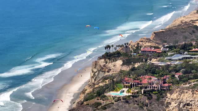 Paragliders flying over La Jolla Shores La Jolla Farms Black’s Beach and Torrey Pines on a beautiful afternoon | Drone Video – 5