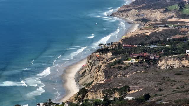 Paragliders flying over La Jolla Shores La Jolla Farms Black’s Beach and Torrey Pines on a beautiful afternoon | Drone Video – 2