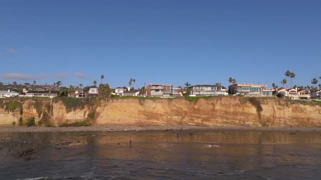Beautiful homes on the cliff and coastline of Pacific Beach in San Diego California | Drone Video