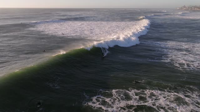 Big Waves and Surfers off the Coast of Pacific Beach in San Diego California | Drone Video
