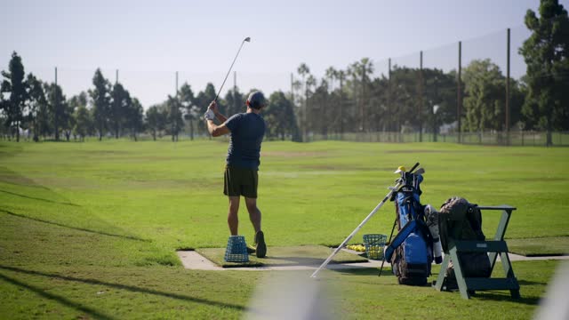 Golfer at the Driving Range at the Golf Course in Coronado | Video