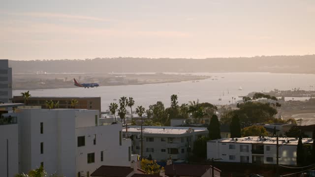 A view of planes landing at San Diego International Airport Lindbergh Field from Bankers Hill Downtown | Video – 1
