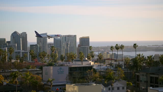 A view of planes landing at San Diego International Airport Lindbergh Field from Bankers Hill Downtown | Video – 2
