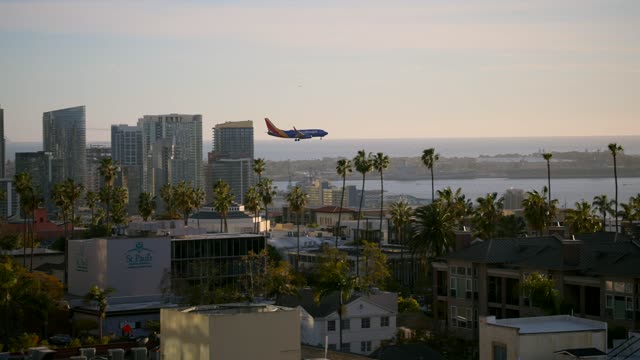 A view of planes landing at San Diego International Airport Lindbergh Field from Bankers Hill Downtown | Video – 3