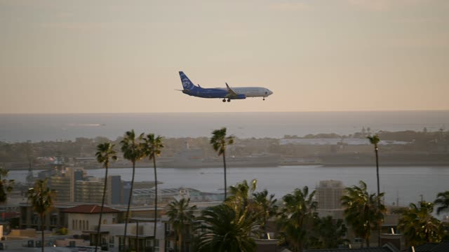 A view of planes landing at San Diego International Airport Lindbergh Field from Bankers Hill Downtown | Video – 7