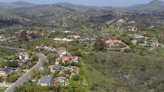 Flying over the neighborhoods and equestrian facilities of Olivenhain in Encinitas | Drone Video – 1