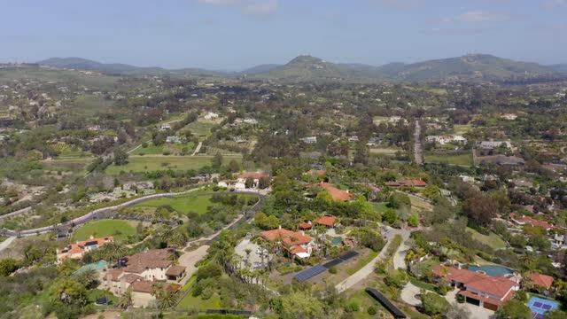 Flying over the neighborhoods and equestrian facilities of Olivenhain in Encinitas | Drone Video – 2
