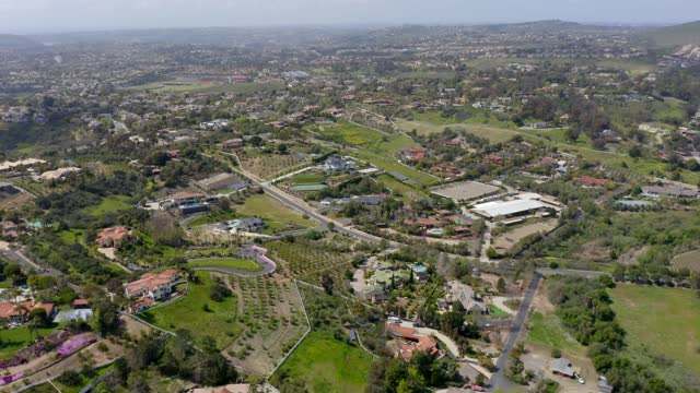 Flying over the neighborhoods and equestrian facilities of Olivenhain in Encinitas | Drone Video – 7