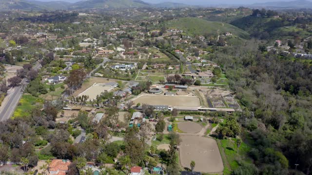 Flying over the neighborhoods and equestrian facilities of Olivenhain in Encinitas | Drone Video – 5