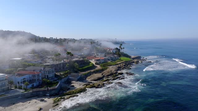 Fog over Windansea Beach and Beach Barber tract in San Diego on a beautiful Monring | Drone Video – 9