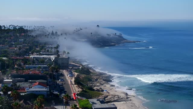 Fog over Windansea Beach and Beach Barber tract in San Diego on a beautiful Monring | Drone Video – 5