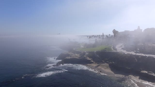 The Fog over Children’s Pool and Wipeout Beach La Jolla Village in San Diego on a beautiful Monring | Drone Video – 2