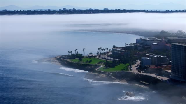 The Fog over Children’s Pool and Wipeout Beach La Jolla Village in San Diego on a beautiful Monring | Drone Video – 6