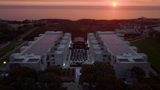 A perfect sunset over Salk Institute the cliffs of Black’s Beach and Torrey Pines in La Jolla San Diego California | Drone Video – 1
