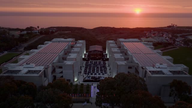 A perfect sunset over Salk Institute the cliffs of Black’s Beach and Torrey Pines in La Jolla San Diego California | Drone Video – 2