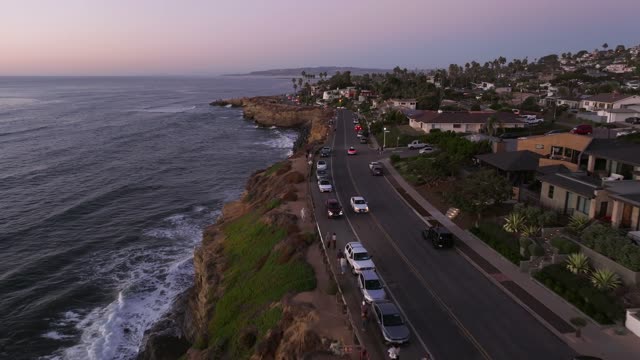 Flying above the Coastline and Beach of Sunset Cliffs Natural Park in Point Loma San Diego | Drone Video