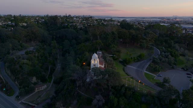 The Junipero Serra Museum in Presidio Park in Mission Hills overlooking Mission Valley during Sunset | Drone Video – 13