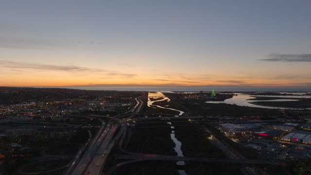 Looking out over the San Diego River towards Mission Beach Mission Bay and Ocean Beach during Sunset | Drone Video – 2