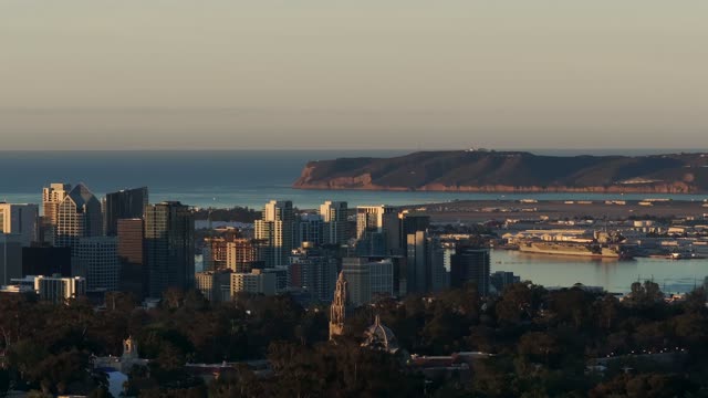 A view of Downtown San Diego and Point Loma from North Park during Sunrise | Drone Video – 3