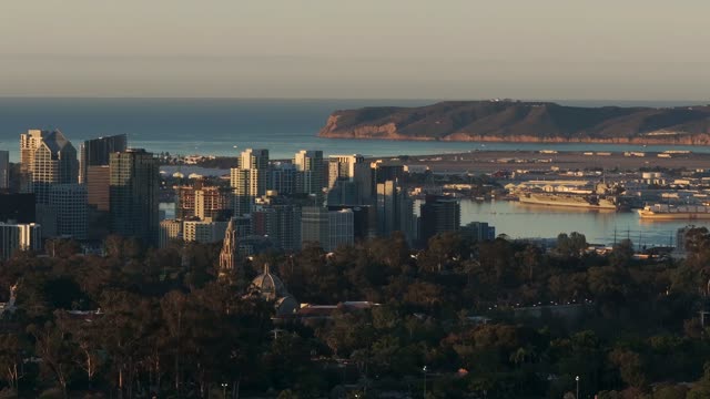 A view of Downtown San Diego and Point Loma from North Park during Sunrise | Drone Video – 4