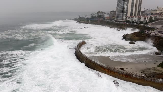 A Stormy and Cloudy day in La Jolla San Diego with big waves at Children’s Pool | Drone Video – 3