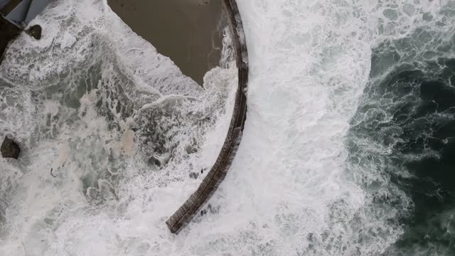 A Stormy and Cloudy day in La Jolla San Diego with big waves at Children’s Pool | Drone Video – 9