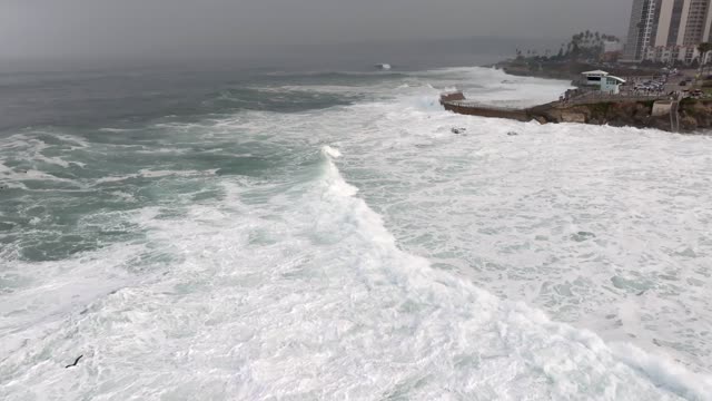 A Stormy and Cloudy day in La Jolla San Diego with big waves at Children’s Pool | Drone Video – 7