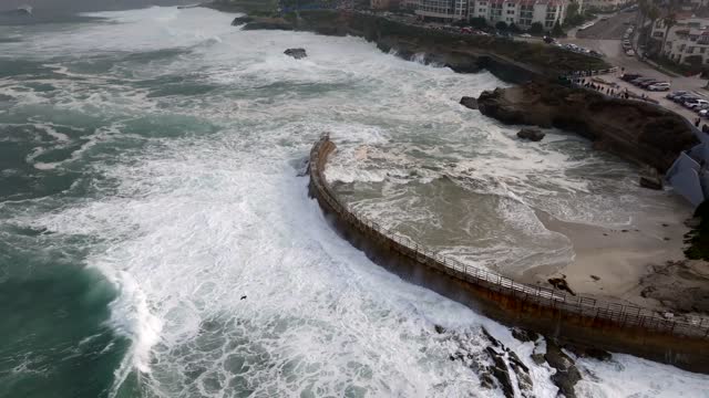 A Stormy and Cloudy day in La Jolla San Diego with big waves at Children’s Pool | Drone Video – 10