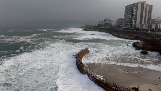 A Stormy and Cloudy day in La Jolla San Diego with big waves at Children’s Pool | Drone Video – 13